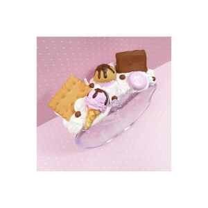 Budzik z herbatnikiem i słodyczami