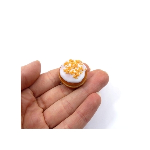 Broszka pączek z lukrem